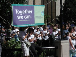 Together we can banner at the Walk the Walk event